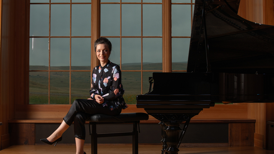 Pianist Yulianna Avdeeva sits at a Steinway grand piano in the Olivier Music Barn at Tippet Rise.