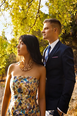 Greg Anderson and Elizabeth Joy Roe look off into the distance.